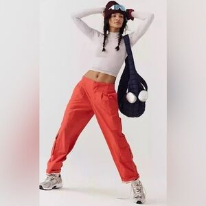 FP Free People Movement Mesmerize Me Cargo Pants Red Bittersweet size Large